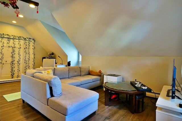 living room featuring a baseboard radiator, dark hardwood / wood-style flooring, and vaulted ceiling