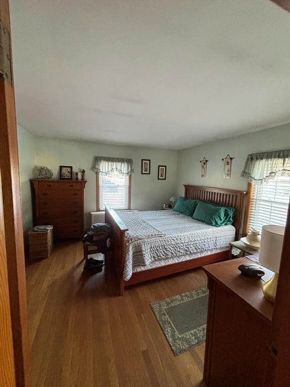 bedroom featuring wood finished floors