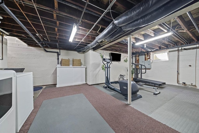 exercise area featuring washer / clothes dryer