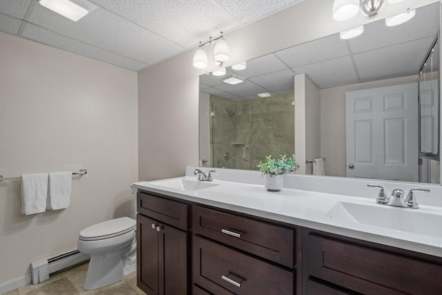 full bath with a shower stall, a baseboard radiator, toilet, and a sink