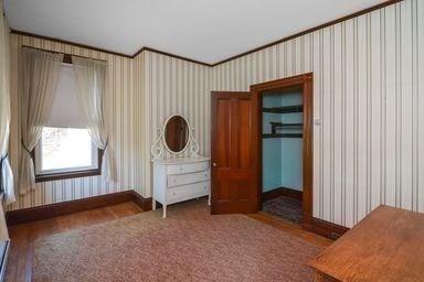 32 Mount Pleasant St, North Brookfield, MA 01535 - unfurnished bedroom featuring baseboards and wallpapered walls