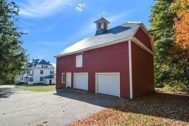 view of property exterior featuring a garage