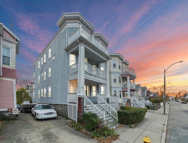 view of front of home with a balcony