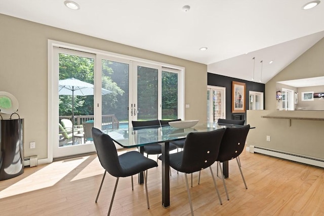 28 Elm St, Berkley, MA 02779 - dining area with light wood finished floors, baseboard heating, recessed lighting, vaulted ceiling, and french doors