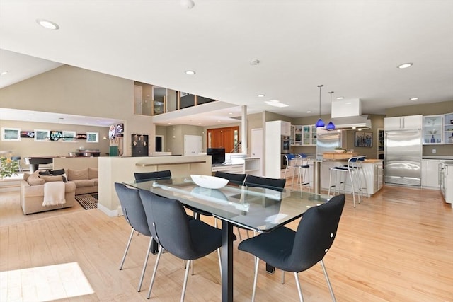 28 Elm St, Berkley, MA 02779 - dining area featuring light wood-type flooring, recessed lighting, and high vaulted ceiling