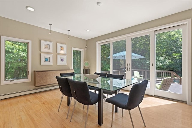 28 Elm St, Berkley, MA 02779 - dining space featuring french doors, a baseboard radiator, light wood-style flooring, and recessed lighting