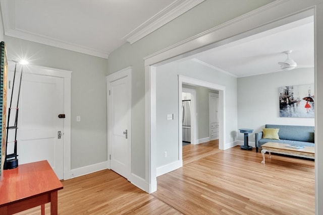137 Freeman St Unit 3A, Brookline, MA 02446 - foyer featuring light wood-style floors, crown molding, and baseboards