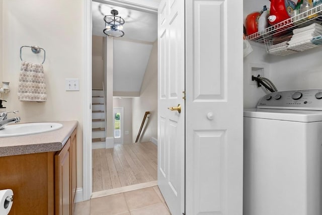 27 Harnden Rd, Billerica, MA 01821 - laundry area featuring washer / dryer and light tile patterned floors