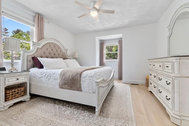 27 Harnden Rd, Billerica, MA 01821 - bedroom with light wood-style floors, a ceiling fan, and baseboards