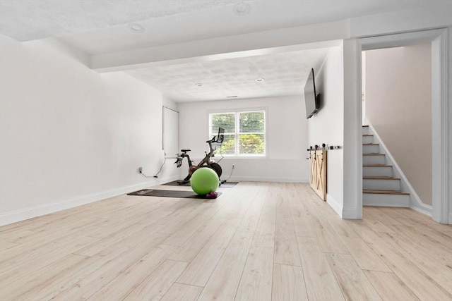 27 Harnden Rd, Billerica, MA 01821 - workout area with wood finished floors and baseboards
