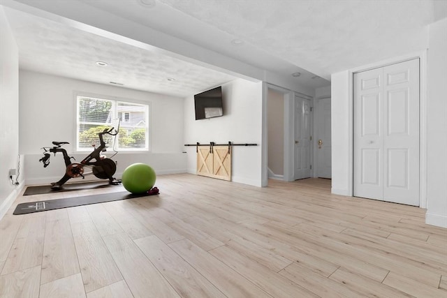 27 Harnden Rd, Billerica, MA 01821 - workout room featuring baseboards and wood finished floors