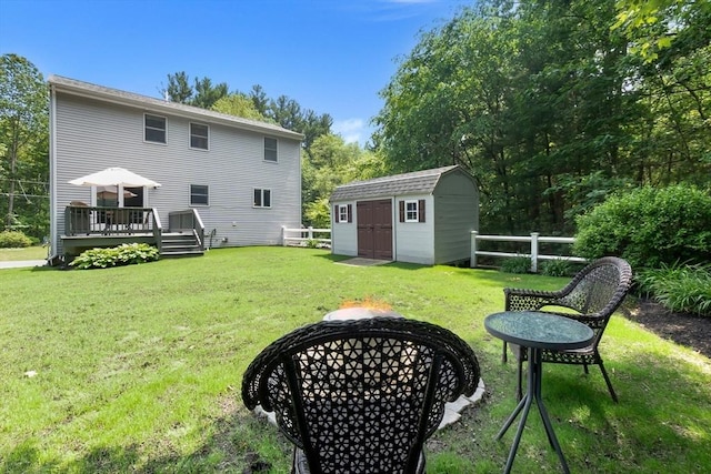 27 Harnden Rd, Billerica, MA 01821 - back of house with a deck and an outdoor fire pit