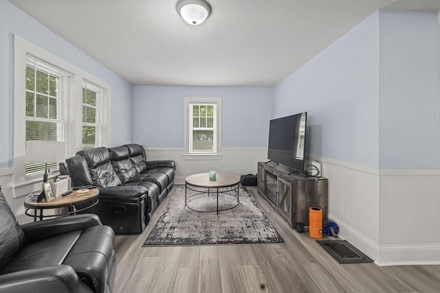 25 Bayley Ter, Weymouth, MA 02190 - living room featuring wood finished floors and a wainscoted wall