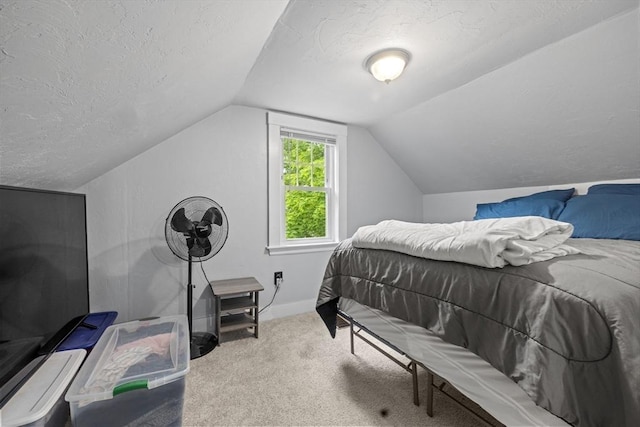 25 Bayley Ter, Weymouth, MA 02190 - carpeted bedroom featuring a textured ceiling, lofted ceiling, and baseboards