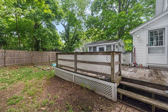 25 Bayley Ter, Weymouth, MA 02190 - deck featuring a fenced backyard and an outdoor structure