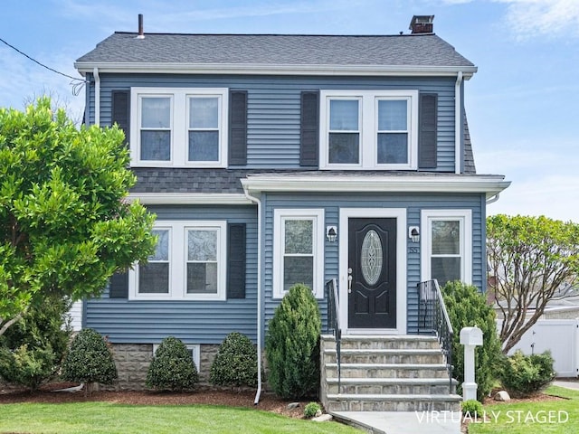 55 Bruce Rd, Waltham, MA 02453 - view of front of home featuring roof with shingles