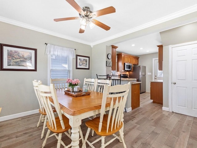 55 Bruce Rd, Waltham, MA 02453 - dining room featuring light wood finished floors, baseboards, ceiling fan, crown molding, and recessed lighting