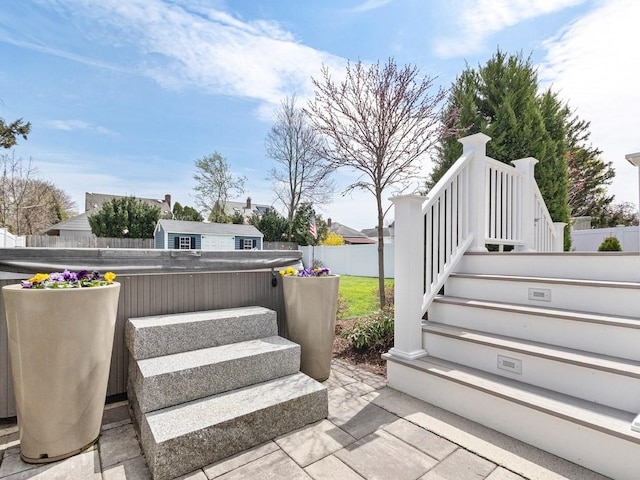 55 Bruce Rd, Waltham, MA 02453 - fenced backyard with a hot tub and stairway