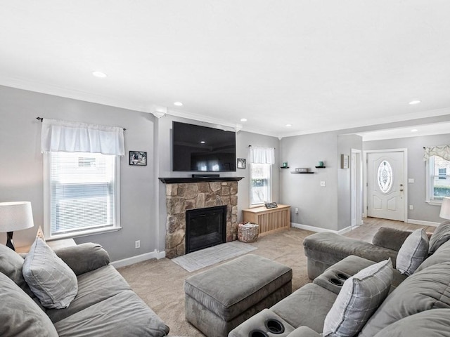 55 Bruce Rd, Waltham, MA 02453 - living area with baseboards, a fireplace, crown molding, recessed lighting, and light carpet