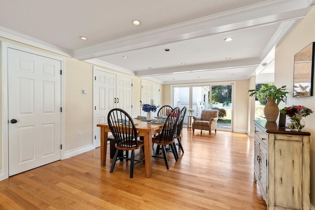 dining area with ornamental molding, light hardwood / wood-style floors, and beamed ceiling