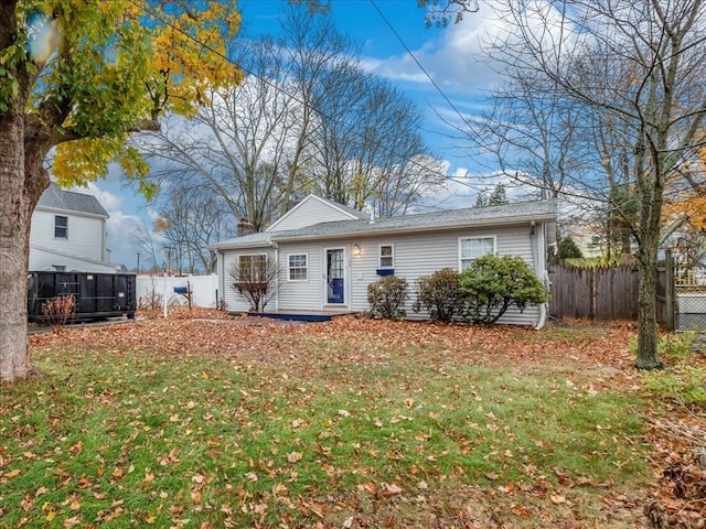 view of front of property with a front lawn