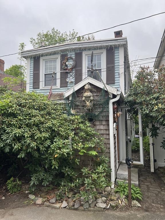 7 Little River St, Haverhill, MA 01832 - view of front of home featuring a chimney