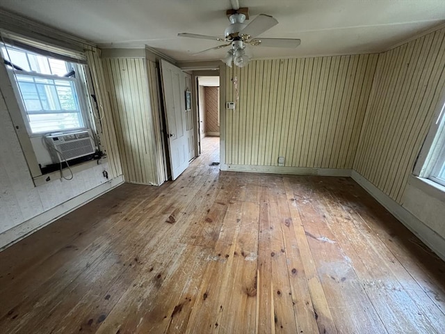 7 Little River St, Haverhill, MA 01832 - empty room with hardwood / wood-style floors, healthy amount of natural light, ceiling fan, and cooling unit