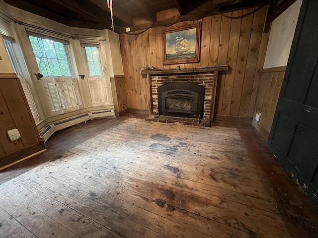 7 Little River St, Haverhill, MA 01832 - unfurnished living room featuring dark wood-type flooring, a fireplace, wooden walls, baseboard heating, and beam ceiling