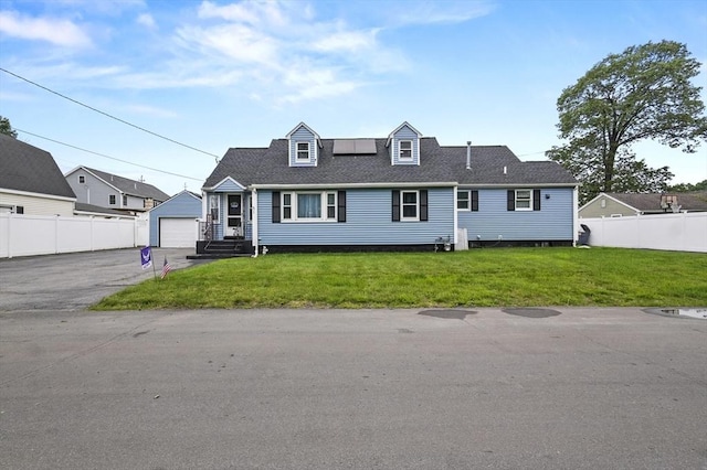 51 Crystal St, Lowell, MA 01852 - new england style home with a garage and entry steps
