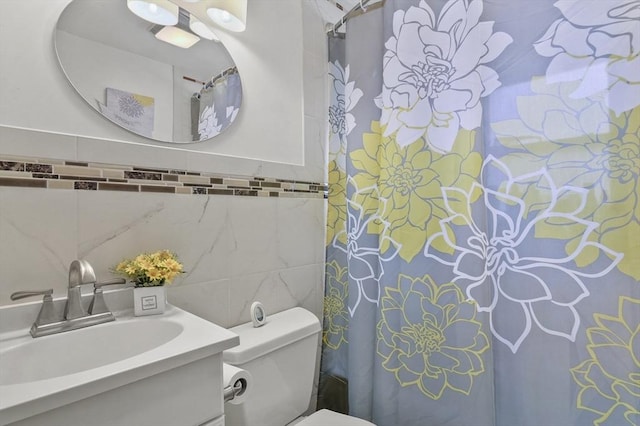 51 Crystal St, Lowell, MA 01852 - full bathroom with tile walls, vanity, and a shower with curtain