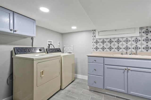 51 Crystal St, Lowell, MA 01852 - laundry room featuring washer and clothes dryer, cabinet space, and recessed lighting