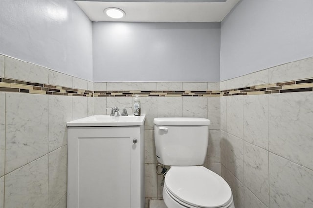 51 Crystal St, Lowell, MA 01852 - bathroom with vanity, tile walls, and a wainscoted wall
