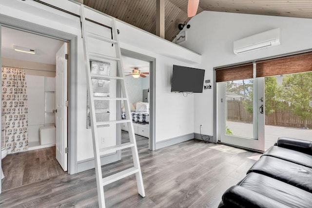 242 Old Wharf Rd Unit B4, Dennis, MA 02639 - living room with a wall mounted air conditioner, ceiling fan, wood ceiling, wood finished floors, and high vaulted ceiling