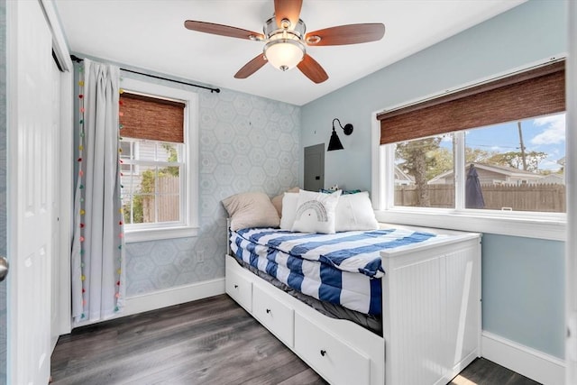 242 Old Wharf Rd Unit B4, Dennis, MA 02639 - bedroom with wallpapered walls, baseboards, dark wood-style flooring, an accent wall, and ceiling fan