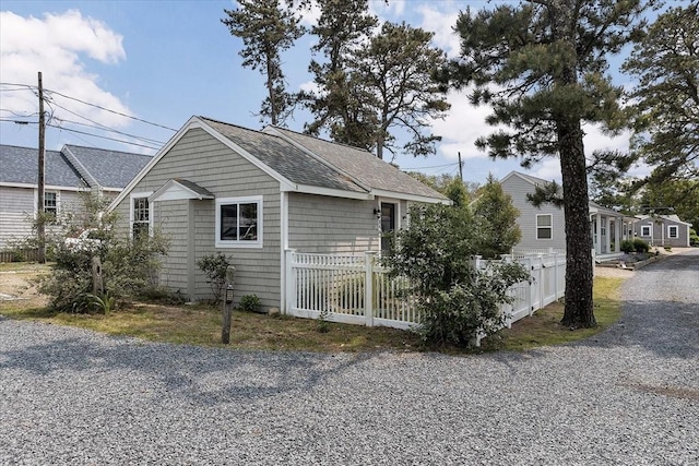 242 Old Wharf Rd Unit B4, Dennis, MA 02639 - view of home's exterior featuring a shingled roof