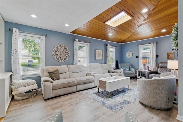 65 Holten St, Danvers, MA 01923 - living room with a skylight, wooden ceiling, recessed lighting, wood finished floors, and lofted ceiling