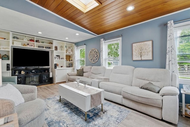 65 Holten St, Danvers, MA 01923 - living room with healthy amount of natural light, wood ceiling, wood finished floors, recessed lighting, and a skylight