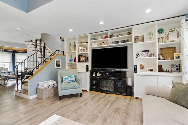 65 Holten St, Danvers, MA 01923 - living room featuring wood finished floors, stairs, and recessed lighting