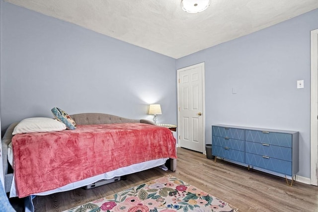 65 Holten St, Danvers, MA 01923 - bedroom featuring wood finished floors and baseboards