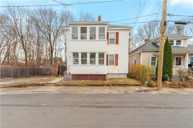 75 Winthrop Ave, West Warwick, RI 02893 - view of front of property with a chimney