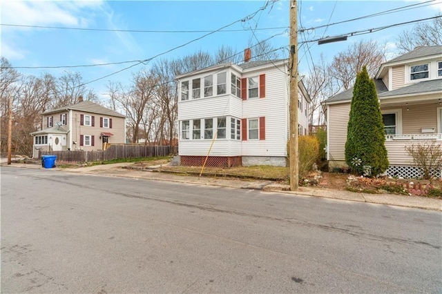 75 Winthrop Ave, West Warwick, RI 02893 - view of front of home with a chimney