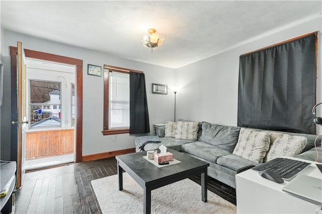 75 Winthrop Ave, West Warwick, RI 02893 - living room with dark wood-type flooring and baseboards