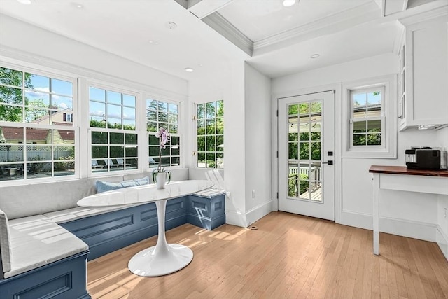 sunroom / solarium featuring french doors