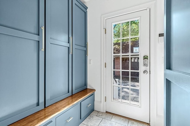 mudroom with light tile patterned floors