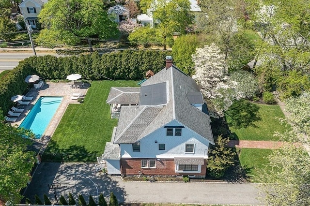 view from above of property with a pool area