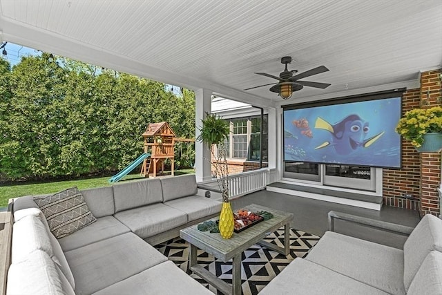 sunroom / solarium with an outdoor living space, a ceiling fan, and plenty of natural light