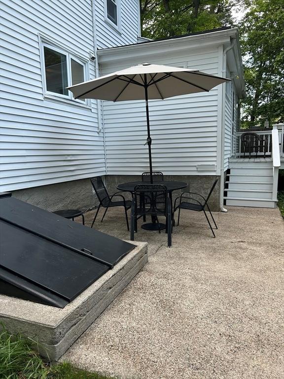 202 Madison St, Dedham, MA 02026 - view of patio / terrace featuring a deck and outdoor dining area