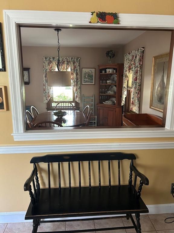 202 Madison St, Dedham, MA 02026 - dining area with tile patterned floors and baseboards