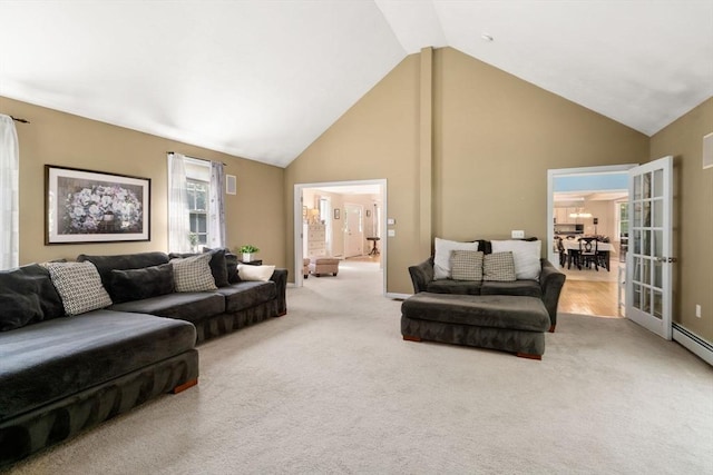 living room featuring carpet floors, high vaulted ceiling, and baseboards