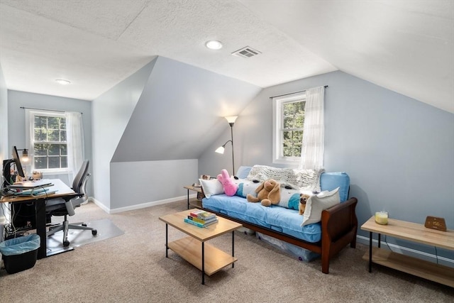 interior space featuring carpet floors, plenty of natural light, visible vents, and baseboards